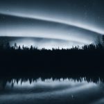 Aurora Borealis Dance Over Lake And Trees