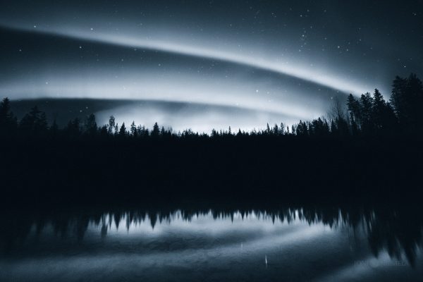 Aurora Borealis Dance Over Lake And Trees