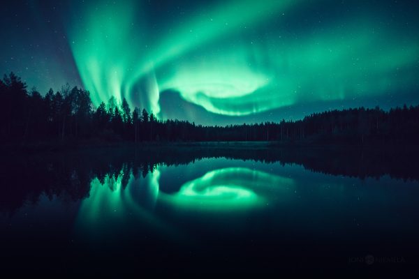 Aurora Borealis Reflecting In Water