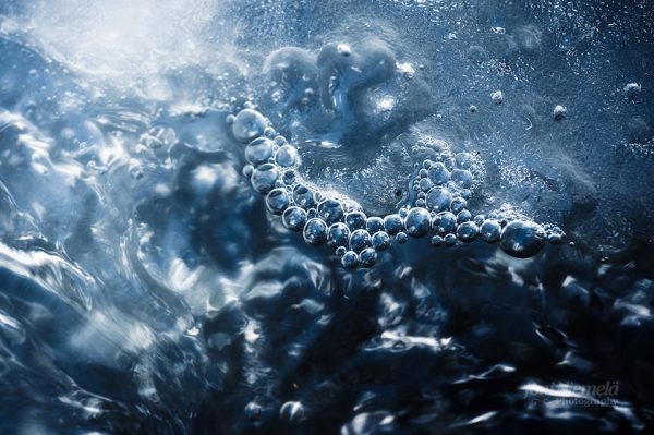 Floating Bubbles In Water And Ice