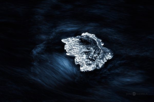 Floating Ice Chunk On Water