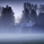 Foggy Field With Distant House