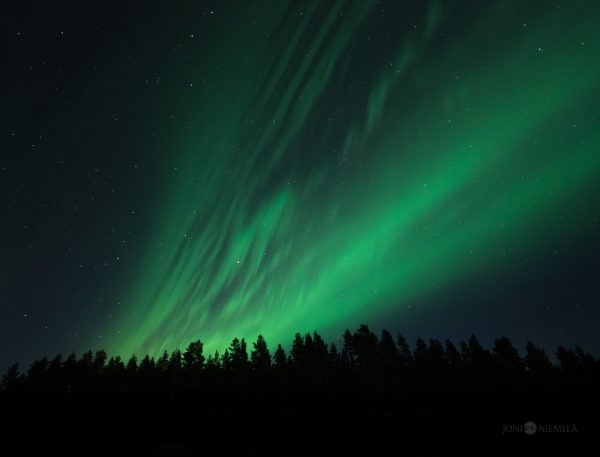 Green Aurora Borealis In The Night Sky