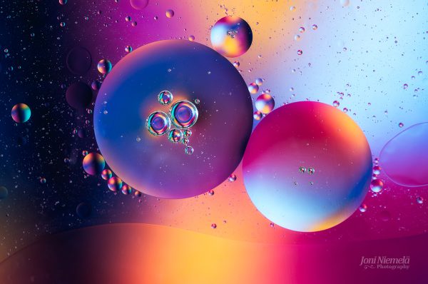 Group Of Bubbles Floating On Top Of Each Other