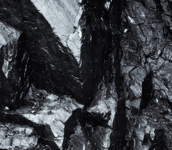 Intricate Natural Patterns Of Mineral Veins In Rock Formation