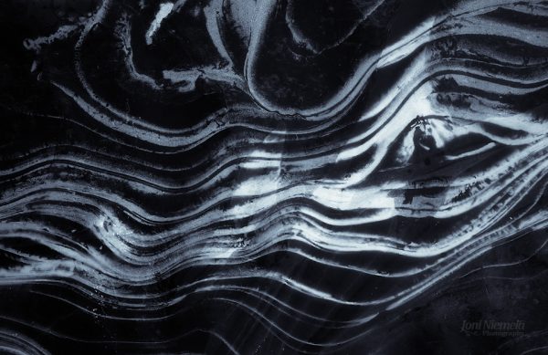 Intricate Patterns Of Ice In Close-Up View