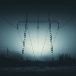 Power Line Cutting Through Foggy Forest