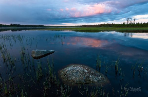 Rock In The Middle Of Water