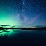 Starry Night Sky Reflecting In Water