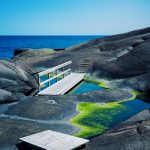 Tranquil Seaside Rocky Landscape With Two Wooden Decks