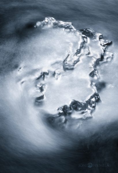 Tranquil Winter Morning Over A Partially Frozen River