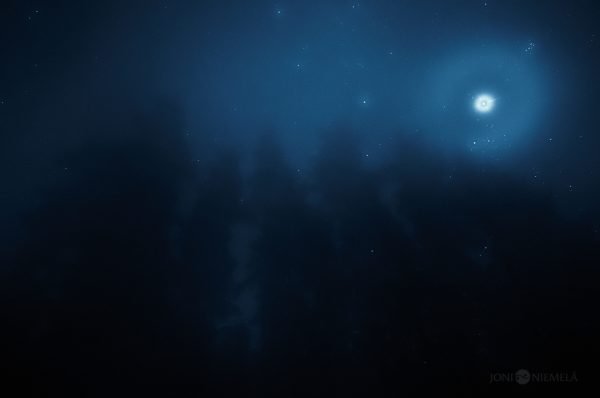 Two Bright Lights Shine In The Dark Sky